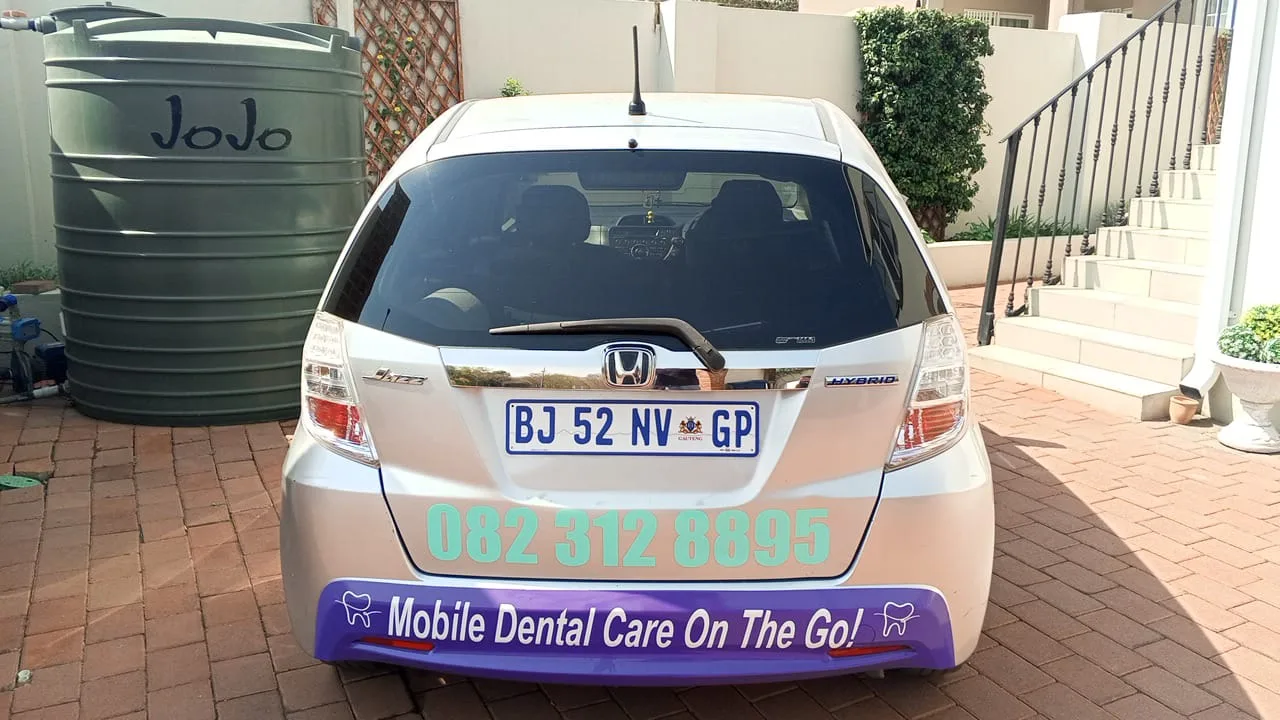 Smile High mobile dental unit, a Honda Jazz branded with our number